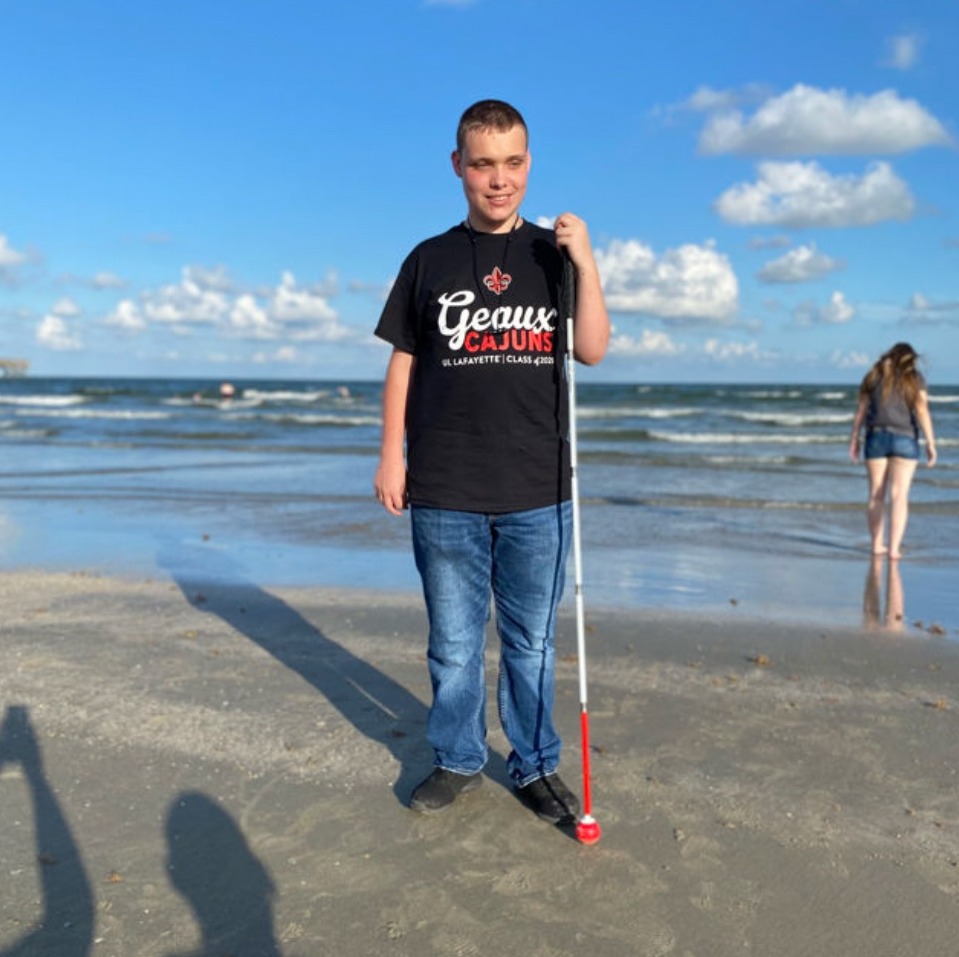 Cover art for Double Time: the producer standing on a beach